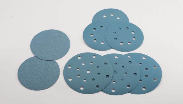 What are dustless abrasive ceramic film discs used for